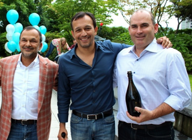 Concur execs Steve Singh, Rajeev Singh and Mike Hilton at the opening of the company